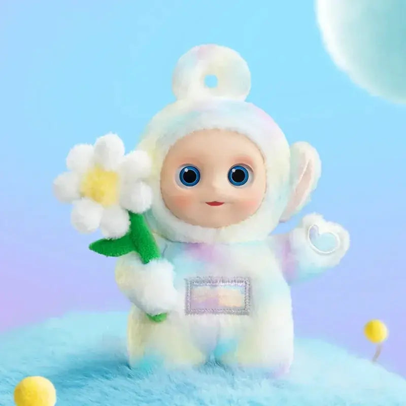 Pendentif peluche Teletubbies Say Hello pastel Mon Bubu Kawaii, personnage bleu pastel tenant fleur.