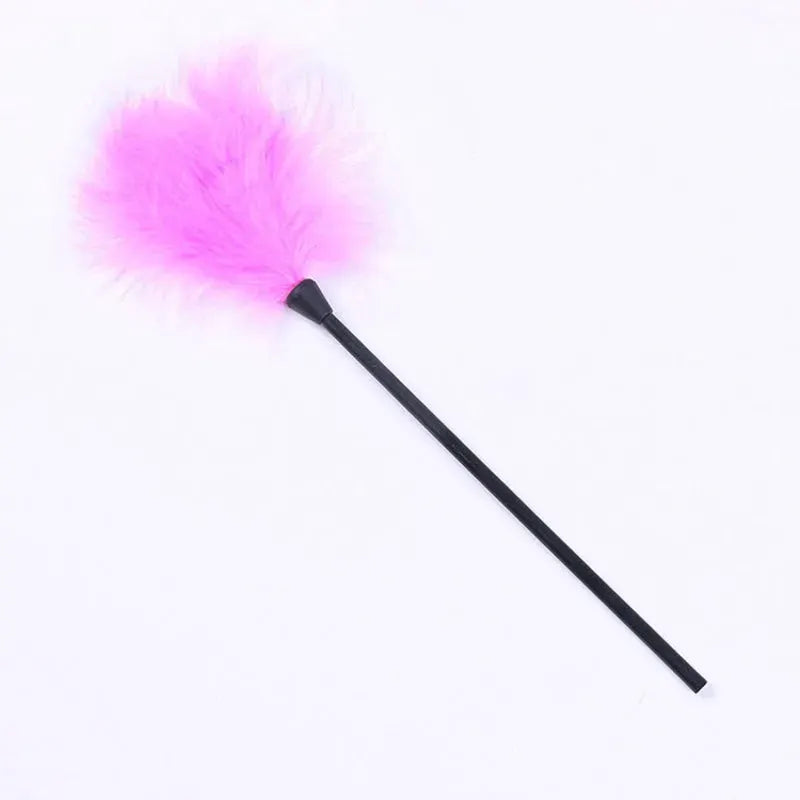 Chatouille en plumes rose vif sur manche noir, accessoire sensoriel de jeu LSDLBoutique