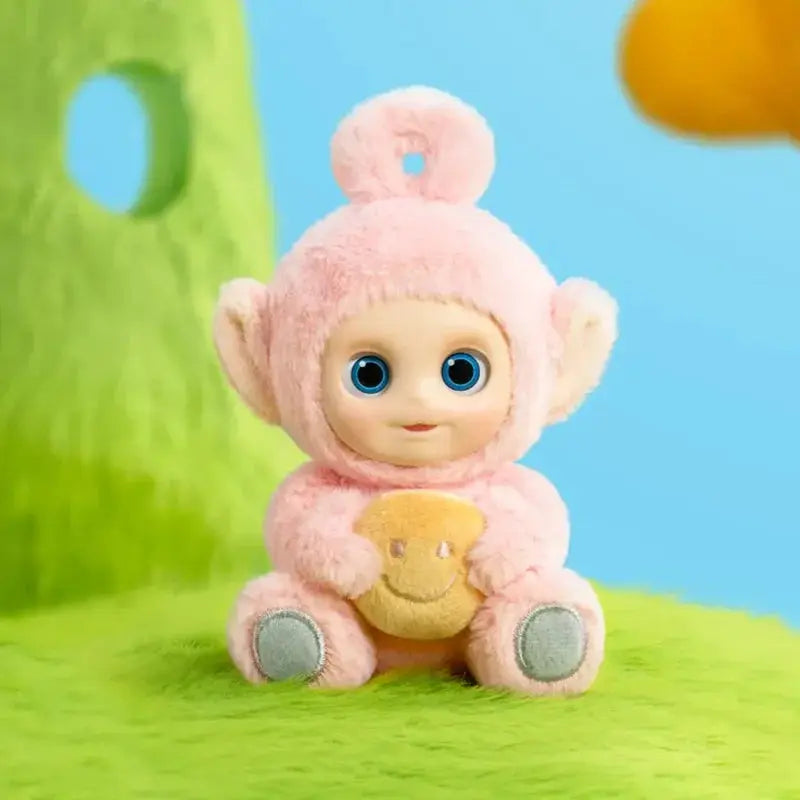 Pendentif peluche rose Teletubbies Say Hello, yeux bleus et sourire jaune.