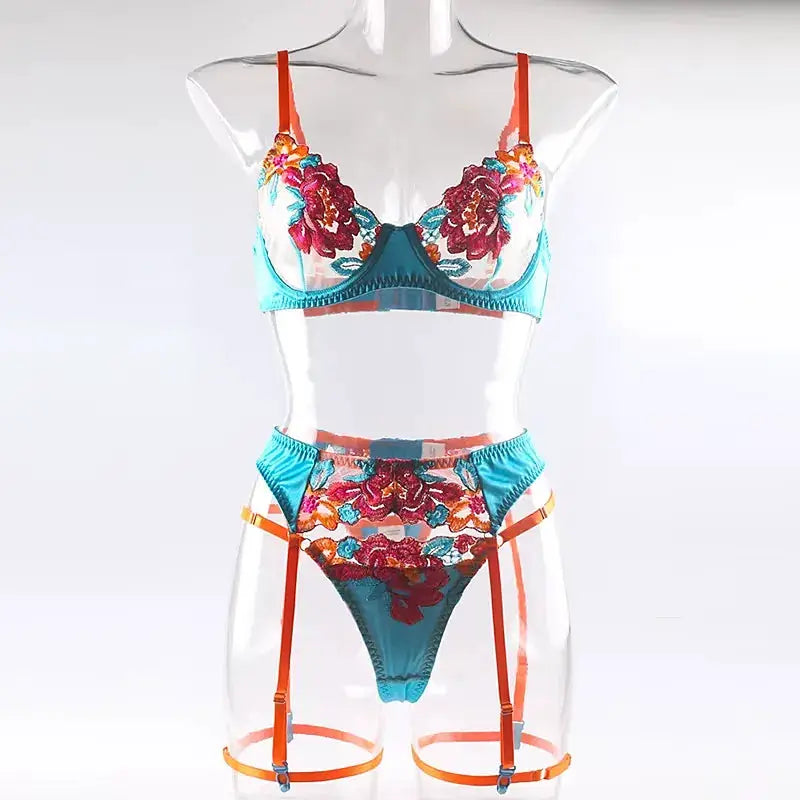 Ensemble lingerie dentelle florale brodée 3 pièces en turquoise et orange, bretelles et jarretelles visibles