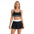 Maillot de bain 2 pièces Martina noir avec bordures blanches; brassière et jupe shorty, Les Secrets de Léa